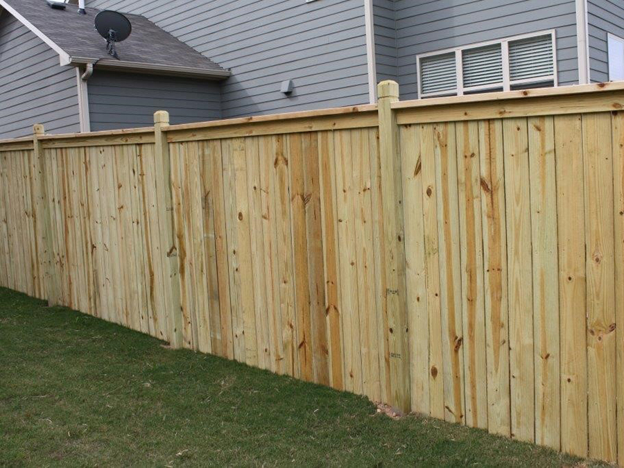 Hoschton GA cap and trim style wood fence