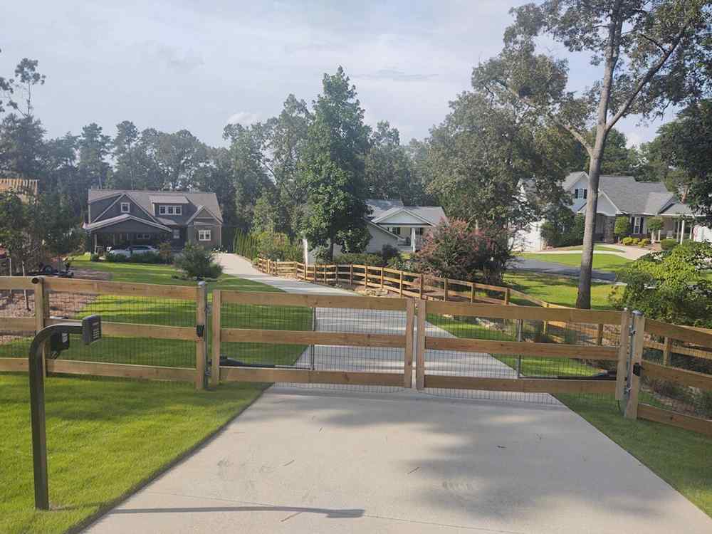 Wood Farm Fence with Automatic Gate Opener in Norcross, Georgia